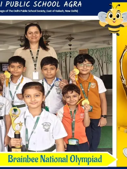 Award winners from DPS Agra holding their trophies and medals from the 2024 competition.