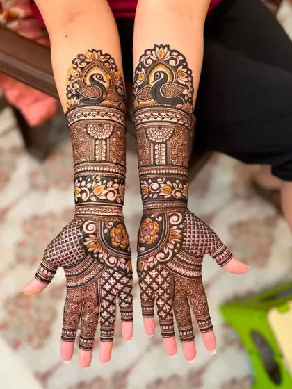 This stunning design features bold, black-filled swan motifs that create a beautiful contrast. The intricate checkerboard and floral patterns complete the look.