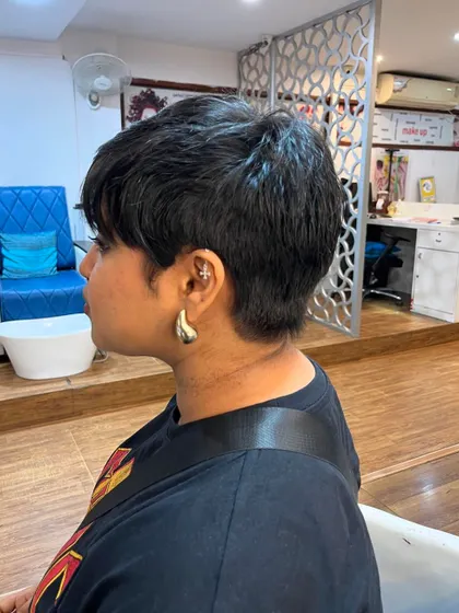 A classic pixie haircut for Sanjana. This is a timeless, chic look.