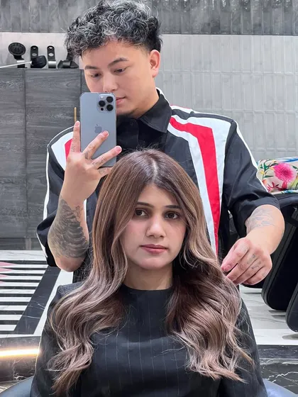 A beautiful, warm-toned balayage that feels fresh and modern. The color is rich and the hair looks incredibly healthy.