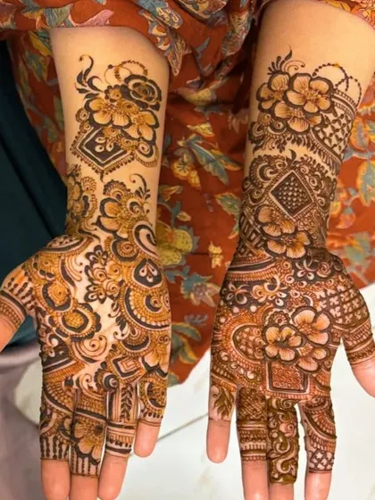 A non bridal design with intricate details. The mix of floral and geometric patterns creates a rich and textured look.
