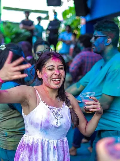 A smile that says it all. A happy dancer enjoying the music and the vibe during the Holi festival party at Skygarden.