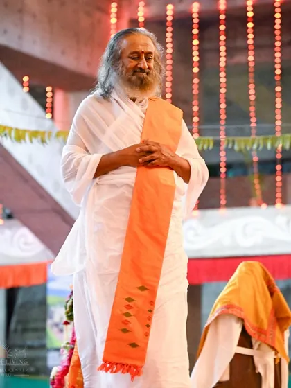 I am standing amidst the lights and decorations of Navratri. The festive atmosphere is a reflection of the inner joy and celebration that these nine days bring.