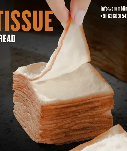 Tissue bread is pulled apart in our product feature, showing the thin layers inside the square bake.