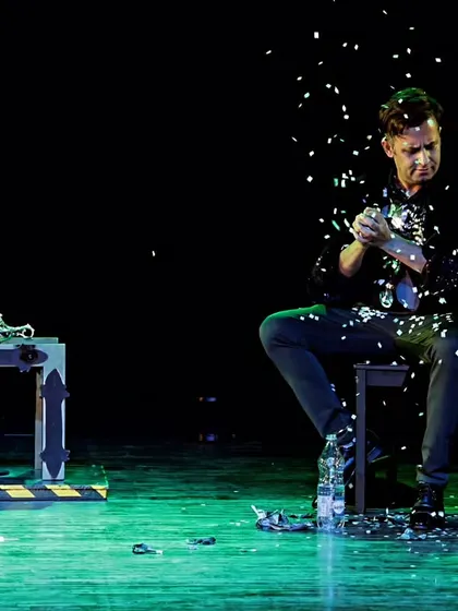 A still shot from my Snow Act during the Las Vegas Magic Show. The falling snow creates a serene and magical atmosphere that provides a visual treat for the audience.