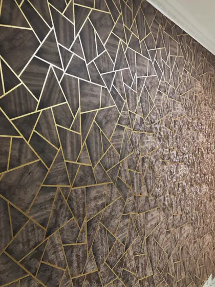 Another angle of the transitional geometric wallpaper, highlighting the blend of patterns and textures.