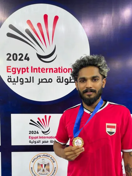 A proud champion. Raghu Mariswamy poses with his Gold Medal, a result of immense dedication and the high-performance training provided at our academy.