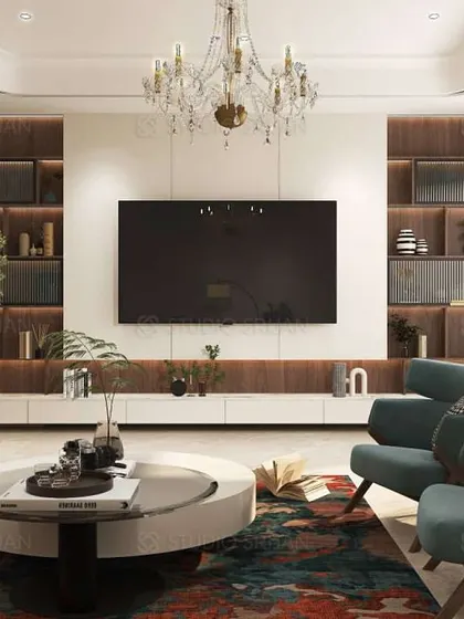 This living room features a custom-built TV unit with integrated shelving and backlighting, creating a sophisticated focal point. The design balances modern aesthetics with warm, homely comfort.