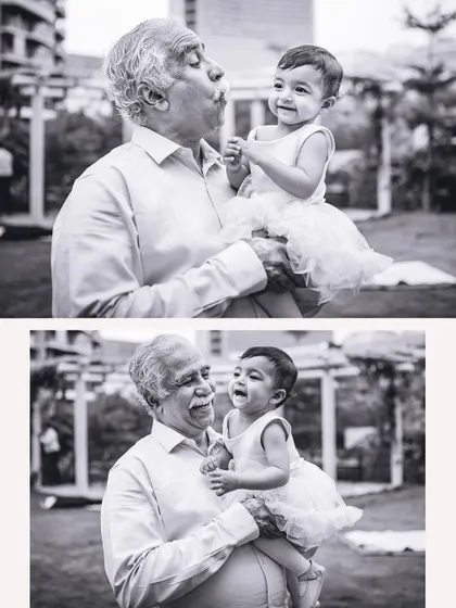 A heartwarming black and white series of a grandfather sharing a playful moment with his granddaughter. These intergenerational photos are priceless treasures from any family event.