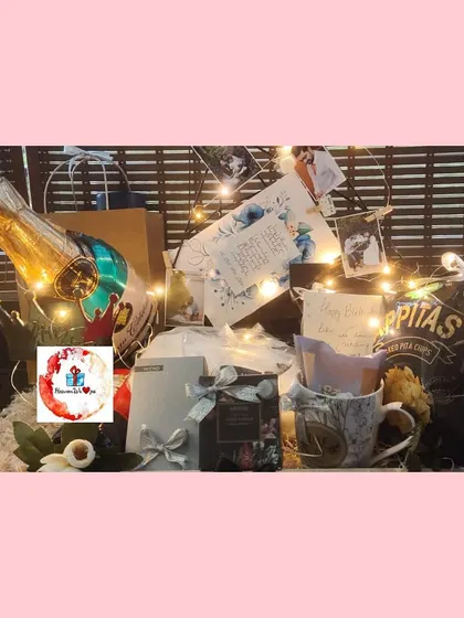 A different angle of the elaborate hamper for a brother, showcasing the variety of snacks, drinks, and personalized elements.