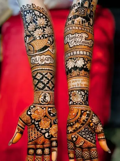 A detailed view of the personalized bridal design with the names 'Manish Ahlawat' and 'Divyam'.