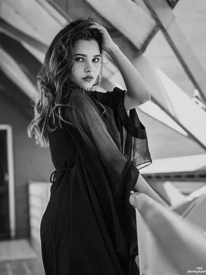 A black and white version of a fashion portrait. Stripping away the color helps to focus on the emotion, form, and texture, resulting in a timeless and classic image.