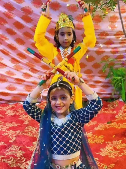 A joyful moment captured during a photoshoot for a kids' festive performance. We create fun and dynamic poses that reflect the energy of the dance.