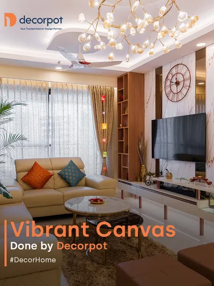 A vibrant and lively living room where the TV unit is part of a larger design story. The white marble-finish panel is flanked by open wooden shelves, perfect for displaying decor and adding personality.