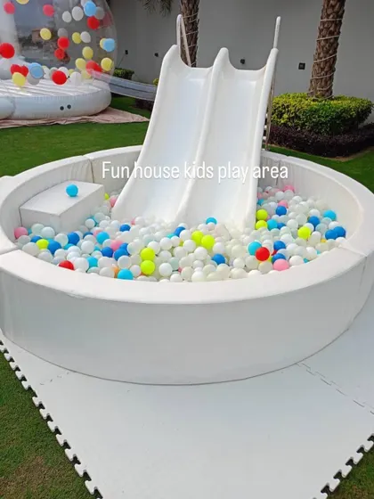 Our white ball pit filled with a mix of white and colorful balls, offering a fun twist on the classic all-white look.