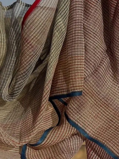 A close-up of the multi-color block-printed Paheli Kota dupatta. The intricate layers of color create a beautiful, versatile accessory.