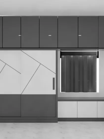 This wardrobe design incorporates a window seat and storage bench into the unit. The geometric pattern on the sliding doors adds a modern, graphic element to the room.