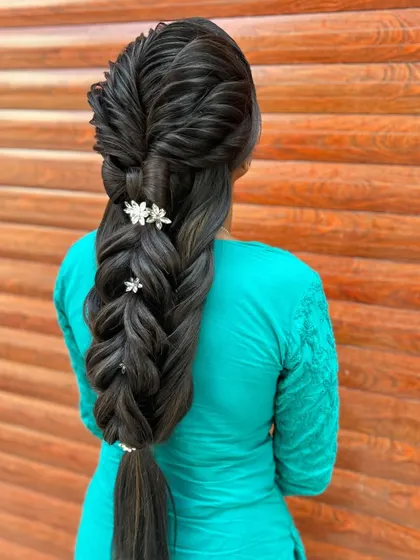 Another perspective on this elegant and intricate braid, a style that is sure to impress clients.