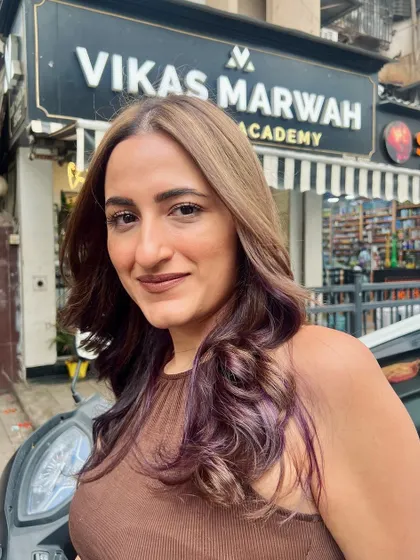 Another shot of the client's beautiful new style. The subtle purple ends add a touch of personality.
