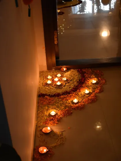 A flower rangoli at the entrance. I love using fresh flower petals to create these beautiful, temporary artworks.