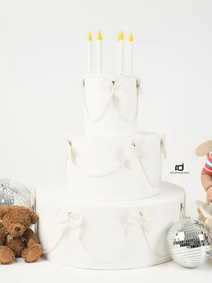 Adding a little hat can change the whole look. This toddler looks so dapper and ready to celebrate his big day.