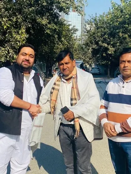 Shaking hands with a colleague after a successful strategy session for our community outreach. We are united in our mission to make legal knowledge accessible to all.