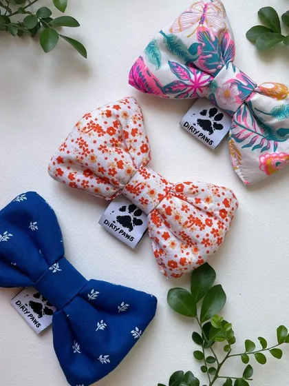 Another beautiful selection of my handmade bows, featuring a royal blue, a delicate floral, and a tropical leaf print. Perfect for any occasion.