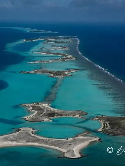 An aerial view shows the incredible geography of the Maldives, a chain of coral atolls stretching across the Indian Ocean. This is our playground, and we know its secrets.