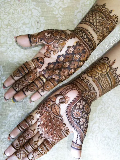 This gallery showcases a variety of my traditional designs. You'll find classic elements like peacocks, elephants, lotuses, and intricate jaali (net) patterns, all expertly crafted to create timeless beauty.