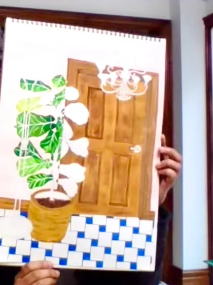 An instructor holds up a work-in-progress showing an interior scene. We teach perspective and composition, helping you draw and paint the world around you.