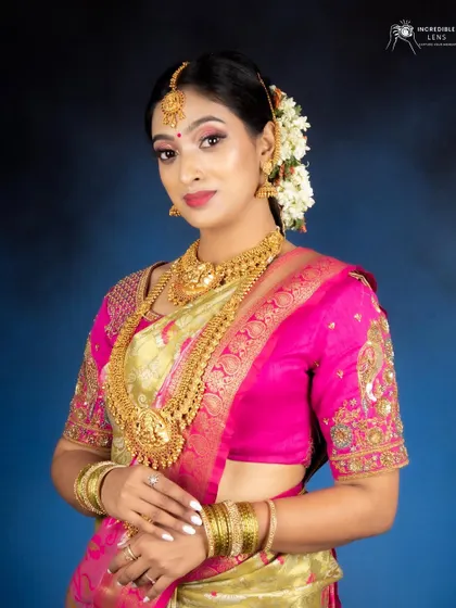 A classic pose for a South Indian bride. The makeup is set perfectly to ensure it stays flawless throughout the long wedding day ceremonies.
