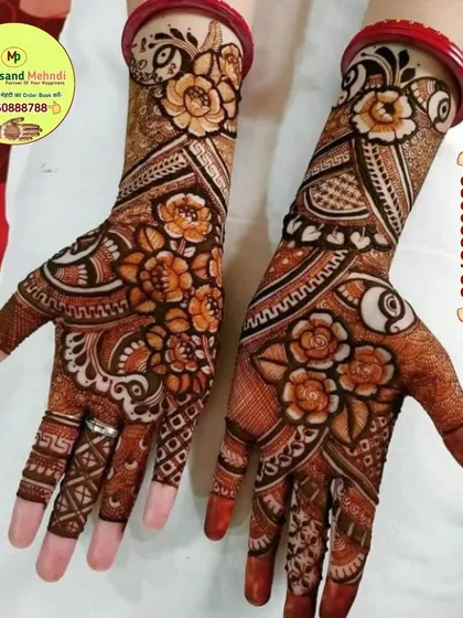 A beautiful floral design with a mix of bold flowers and delicate patterns. This is a versatile look that is perfect for any festival or celebration.