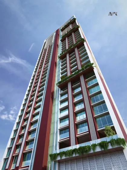 A low-angle view of the upcoming Project Centrico in Mumbai. The design emphasizes its verticality and modern aesthetic, with green spaces integrated into the structure to enhance the living experience.