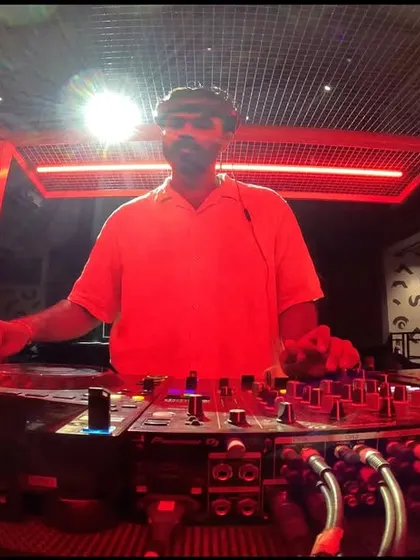 Another perspective from the DJ booth at Sunburn Union, showing my complete focus while managing the mix.