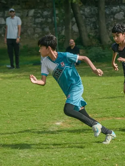 A player bursts forward on a counter-attack, a key strategy taught during our coaching sessions.