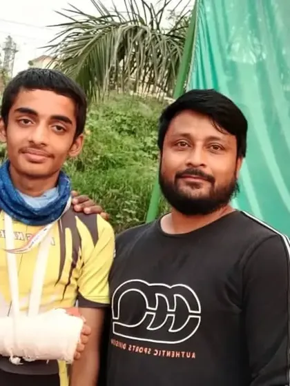 Nirvikar with his coaches, proudly holding his gold medal despite an injury. This shows the resilience and "unstoppable attitude" we instill in our children.