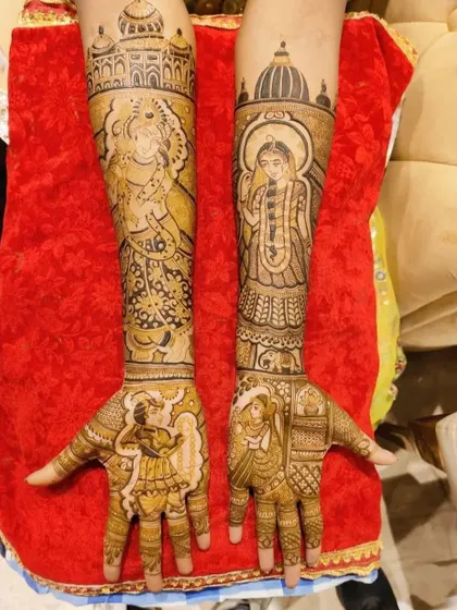 A grand design featuring portraits of deities and a royal bride and groom, perfect for a traditional wedding.