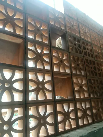A close-up view of the floral-patterned terracotta jali blocks we often use. You can see the quality of the material and the clean design that adds a traditional yet timeless feel to any space.