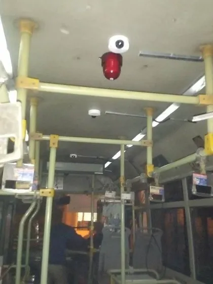 My work is not just for buildings. I also perform specialized installations, like setting up a complete multi-camera surveillance system inside this public bus for passenger safety.