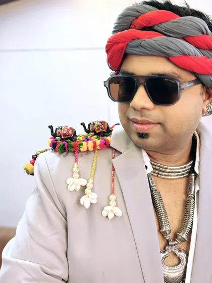 Another angle of my Navratri look, highlighting the colorful shoulder details and traditional jewelry. I believe in fully embracing the theme of the event.