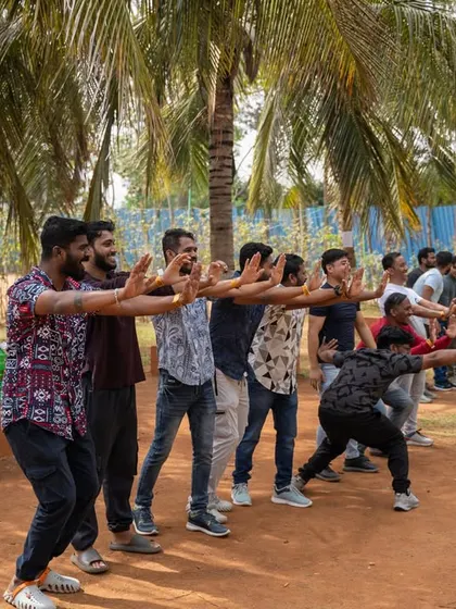 A collection of images showcasing our certified trainers, our team's camaraderie during outings and celebrations, and our commitment to women's sports events.