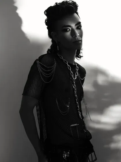 A high-contrast shot playing with shadow and silhouette. This adds a graphic, edgy feel to a male model's book.