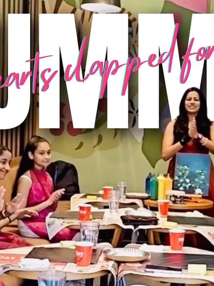 A snapshot of the moment everyone clapped for my mom. It shows the warm, family-like atmosphere we have at our workshops. We're more than just a class; we're a community.