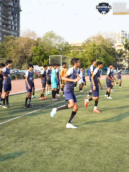 Players line up for a running drill, building the fitness and endurance needed for a 90-minute game.