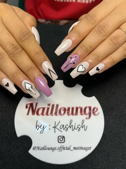 A trendy and eclectic set with a mix of nude and mauve nails, featuring hand-painted hearts and abstract line art.