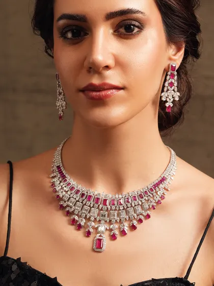 A grand diamond and ruby necklace, perfect for a glamorous reception or cocktail party.