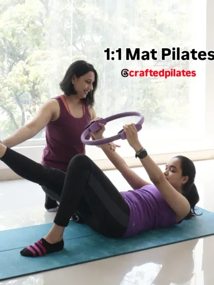 A one-on-one Mat Pilates session in my studio. Using props like the Pilates ring, I help clients deepen their core connection and precisely target specific muscle groups for a more effective workout.