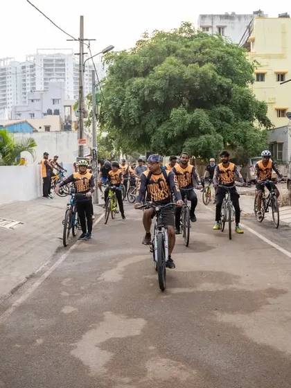 The cycling group sets off from the starting point, ready for an adventurous ride.