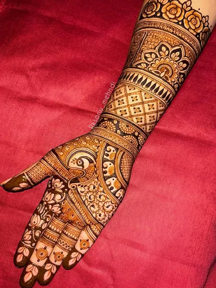This stunning ring ceremony design is filled with beloved traditional symbols. I combined floral patterns with peacock and elephant motifs to create a rich, celebratory look perfect for an engagement.