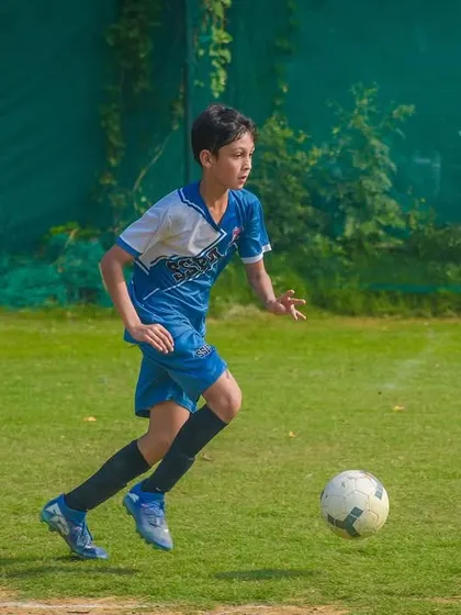 A player on the run, demonstrating the endurance and fitness required to compete at a high level.